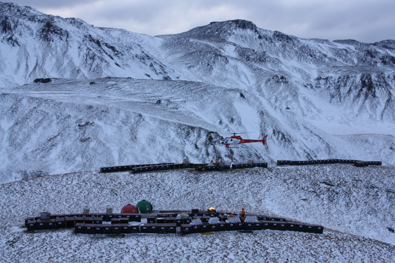 Mission staff loading bait into helicopter buckets on Macquarie Island, which lie halfway between New Zealand and Antarctica.